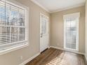 Bright office space with neutral walls, wood flooring, and large windows at 2702 Norma Cir, Decatur, GA 30034