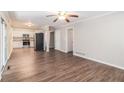 Open concept kitchen with granite countertops and stainless steel appliances at 2307 Cresta Dr, Decatur, GA 30032