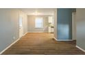 Dining area with hardwood floors and view of kitchen at 3597 Fairlane Nw Dr, Atlanta, GA 30331