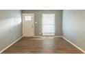 Bright living room with hardwood floors and neutral walls at 3597 Fairlane Nw Dr, Atlanta, GA 30331