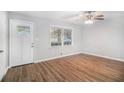 Living room with hardwood floors and neutral walls at 844 Parkstone Dr, Stone Mountain, GA 30083