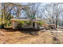 Brick ranch house nestled among mature trees at 2168 Polar Rock Sw Pl, Atlanta, GA 30315