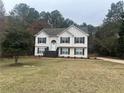 Two story house with brown accents and landscaping at 360 Chestnut Dr, Covington, GA 30016