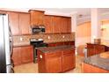 Kitchen with granite countertops and an island at 8178 Lochley Dr, Fairburn, GA 30213