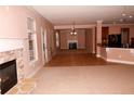 Open floor plan connecting the living and dining areas at 8178 Lochley Dr, Fairburn, GA 30213