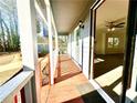 Front porch access to living room with hardwood floors at 3945 Peninsula Ct, Lawrenceville, GA 30044