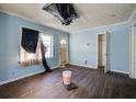 A living room with hardwood floors needing renovation at 1743 Marcel Sw Ave, Atlanta, GA 30311