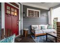 Cozy front porch with seating area and red front door at 1337 Benteen Park Se Dr, Atlanta, GA 30315