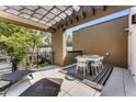 Private rooftop patio with pergola, dining table, chairs, and lounge chairs at 1099 North Ne Ave # 11, Atlanta, GA 30307