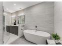 Spa-like bathroom with soaking tub and glass shower at 1099 North Ne Ave # 12, Atlanta, GA 30307