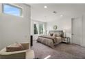 Spacious bedroom with plush carpet and large window at 241 Maynard Se Ter # 14, Atlanta, GA 30316