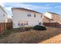 House back view, showing a two-story house with a yard at 6469 Alder Ln, Norcross, GA 30093