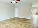 Bright living room with vinyl plank flooring and neutral walls at 1797 Brookside Lay Cir, Norcross, GA 30093