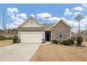 Charming craftsman style home with a two car garage at 7250 Lacey Dr, Douglasville, GA 30134