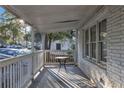 Front porch with white railings and small table at 1093 Kipling Se St, Atlanta, GA 30315