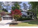 Newly renovated house featuring a two-car garage at 4827 Springfield Dr, Atlanta, GA 30338