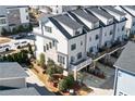 Aerial view of townhome community showcasing the homes' design and layout at 324 Concord St, Alpharetta, GA 30009