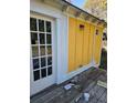 Yellow siding with white trim and a wooden deck at 1786 Lakewood Ave, Atlanta, GA 30315