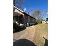 Side view of house showing additional parking and yard at 1839 Lakewood Ave, Atlanta, GA 30315