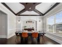 Bright dining room with coffered ceiling and large window at 188 Radcliffe Dr, Mcdonough, GA 30253