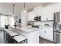 Modern kitchen featuring white cabinets and an island at 331 Skylar Se Way, Atlanta, GA 30315