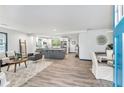 Open living area with a modern kitchen and hardwood floors at 2447 Lynn Iris Dr, Decatur, GA 30032