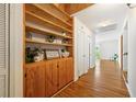 Built-in shelves and hardwood floors in entryway at 282 Evelyn Nw St, Marietta, GA 30064