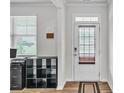 Bright entryway with storage and wood flooring at 4929 Calgary Dr, Douglasville, GA 30135