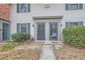 Attractive townhome entrance with double doors and walkway at 3119 Colonial Way # I, Atlanta, GA 30341