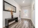 Bright entryway with a mirror and console table at 3580 Townley Ln, Cumming, GA 30040