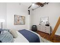 Comfortable main bedroom with hardwood floors and plenty of natural light at 150 Walker Sw St # 5, Atlanta, GA 30313