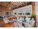 Bright dining area with glass table and seating for six at 150 Walker Sw St # 5, Atlanta, GA 30313