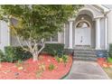 Welcoming front entrance with stone steps and landscaping at 5170 Stone Croft Trl, Atlanta, GA 30331