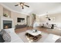 Living room with hardwood floors, fireplace and seating area at 3606 High Battery Nw Blf, Acworth, GA 30101