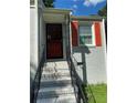 Front entrance with brick steps and a decorative metal railing at 723 Casplan Sw St, Atlanta, GA 30310
