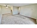 Living room with neutral carpeting and ample space at 300 Johnson Ferry Rd # B711, Atlanta, GA 30328