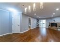 Hardwood floors, fireplace, and neutral walls in this living room at 970 Sidney Marcus Ne Blvd # 1316, Atlanta, GA 30324