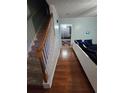 Bright hallway with hardwood floors and staircase at 4127 Conley Pond Ct, Decatur, GA 30034