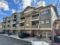 Three-story building with multiple units, garages, and balconies at 655 Mead St # 28, Atlanta, GA 30312