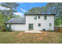 Spacious backyard with a patio perfect for outdoor entertaining at 372 Rustic Ridge Cir, Lawrenceville, GA 30043