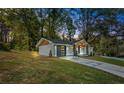 Modern home with a newly paved driveway and landscaping at 2690 Williamsburg Dr, Decatur, GA 30034