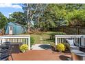 Spacious backyard with deck, shed, and stone pathway at 468 Pasley Se Ave, Atlanta, GA 30316