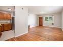 Bright living room with hardwood floors and open kitchen at 4218 Tara Dr, Forest Park, GA 30297