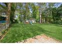 Spacious backyard with playset and shed at 633 Tom Read Dr, Marietta, GA 30062