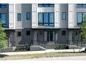 Townhome exterior with gray siding and white trim at 1160 Ormewood Ave # 11, Atlanta, GA 30316