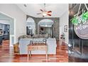 Spacious living room with hardwood floors and stone fireplace at 12551 Alcovy Rd, Covington, GA 30014