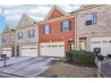 Attractive brick townhome with 2-car garage at 7091 Fringe Flower Dr, Austell, GA 30168