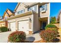 Two-story home with double garage and landscaped front yard at 92 Grampian Ct # 14, Marietta, GA 30008