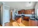 Modern kitchen with dark wood cabinets and granite countertops at 2015 Liberty Nw Ct, Atlanta, GA 30318