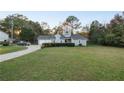 House exterior showcasing a driveway and landscaped yard at 78 6Th St, Emerson, GA 30137